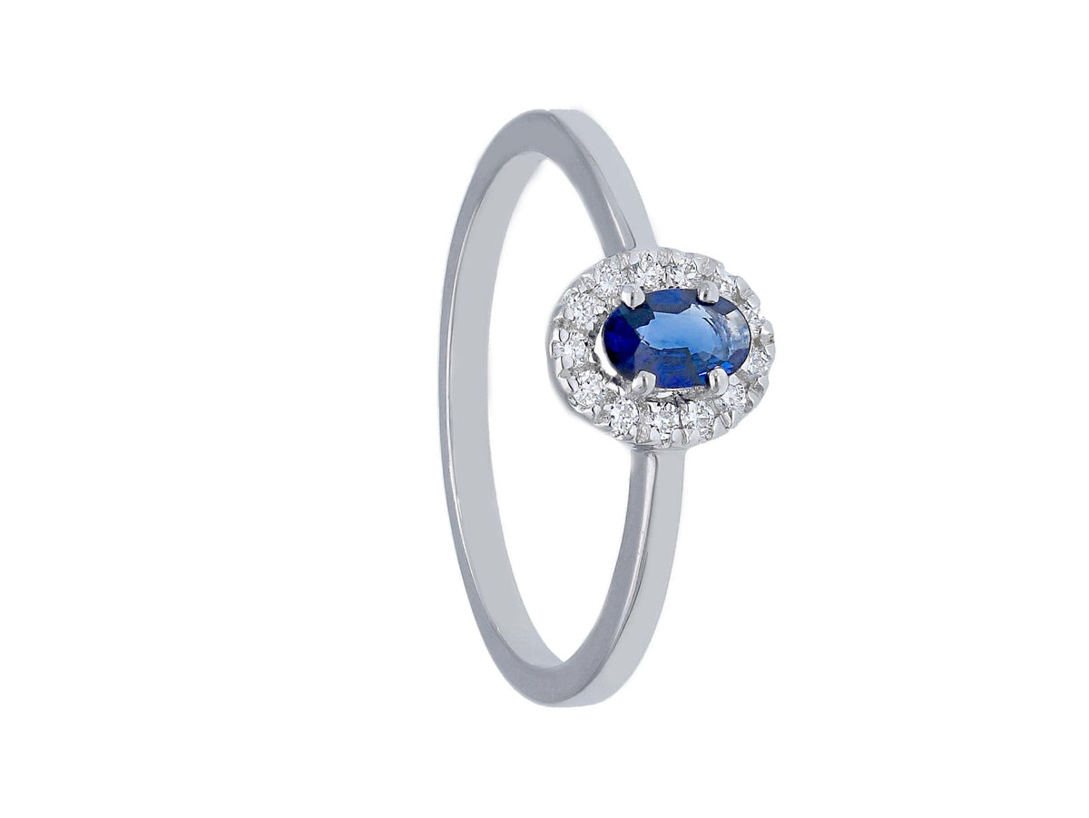 White Gold Ring with Diamonds and Sapphire 0.25 ct