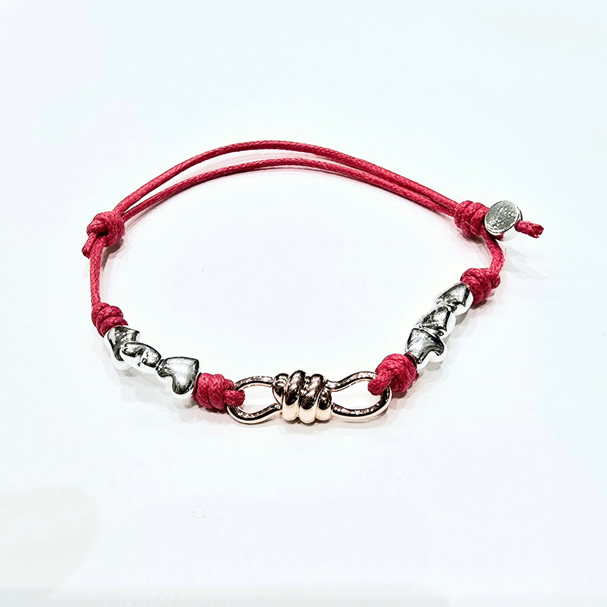 Dodo Bracciale con nodo oro rosa e cuori argento con cordino